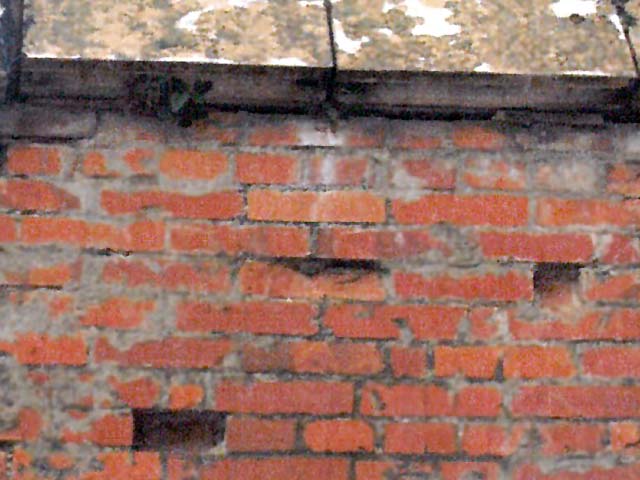 Damage to brick masonry from weather over the years